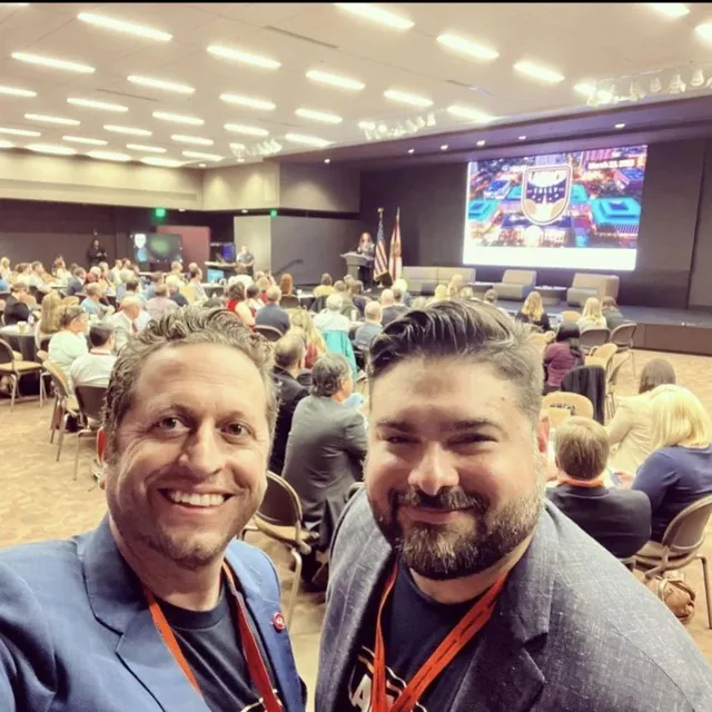 Eddie Gonzalez Loumiet attending a business conference in Tallahassee