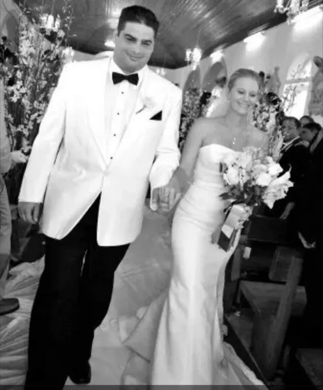 Eddie Gonzalez Loumiet on his wedding day with family and friends celebrating