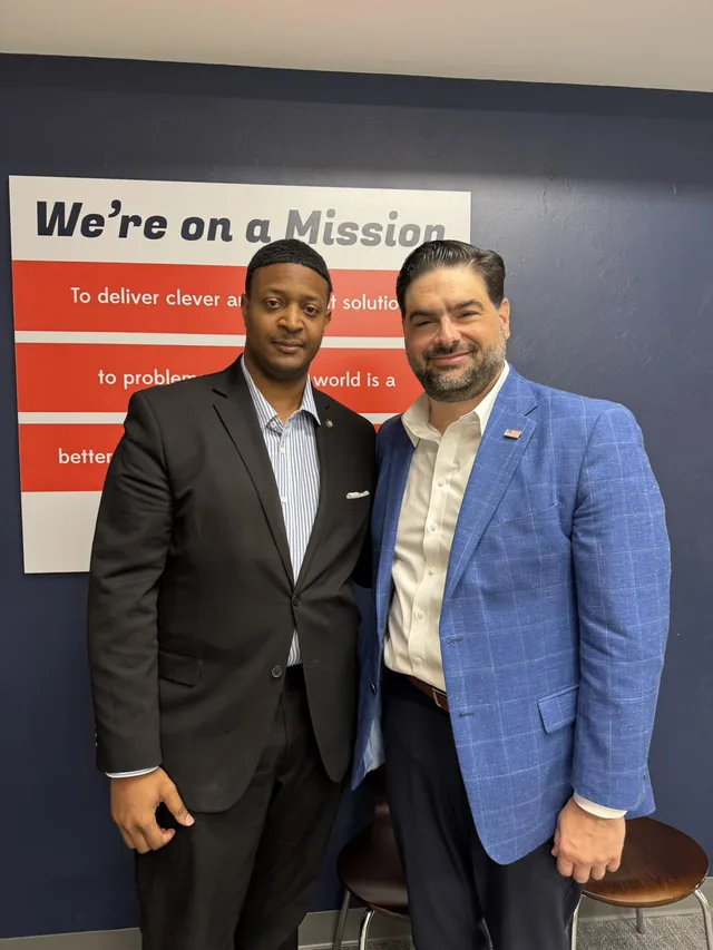 Eddie Gonzalez Loumiet engaging with community members at a Tallahassee outreach gathering