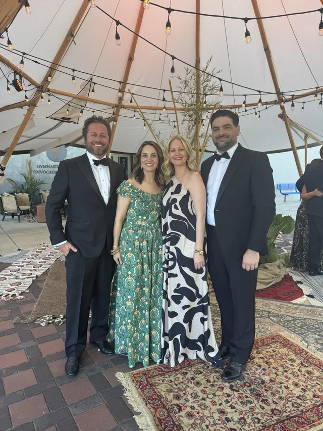 Eddie Gonzalez Loumiet in black tie attire at a formal fundraising event