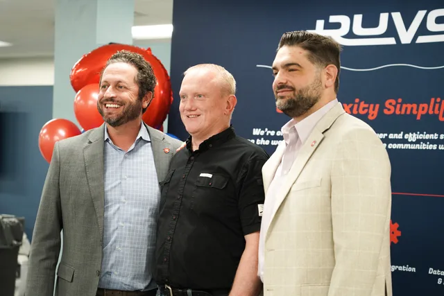 Eddie Gonzalez Loumiet posed with the full Ruvos healthcare technology team