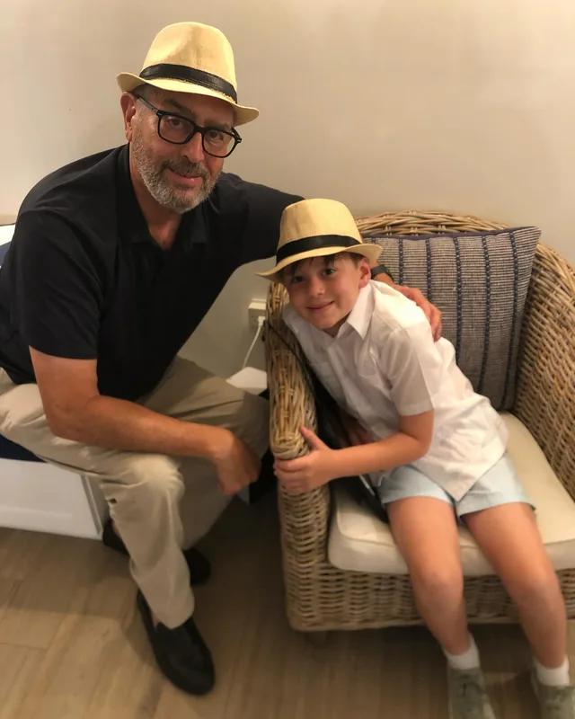 Eddie Gonzalez Loumiet and friends or family wearing matching hats at an outing
